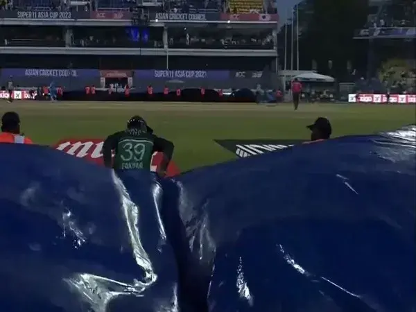 Fakhar Zaman's Selfless Act : Assisting Ground Staff during India-Pakistan Clash Disrupted by Rain.
